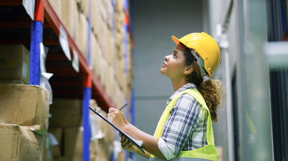 Worker inventory inspect staff checking stock and inspect package