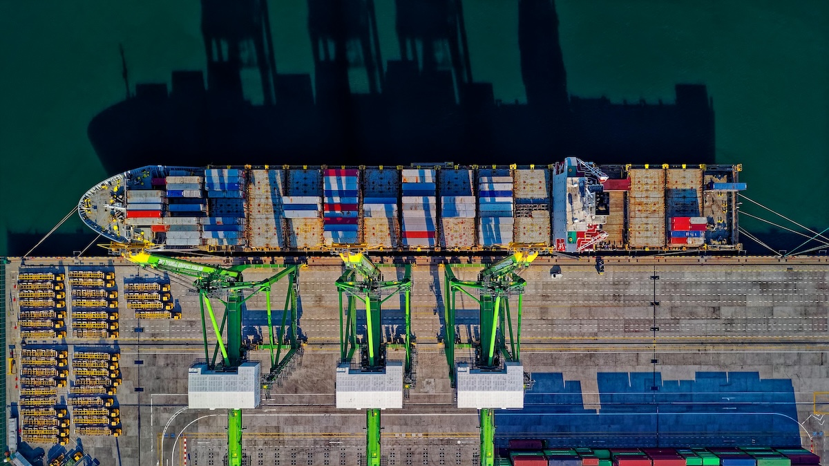 A photograph of a shipping vessel taken from above it.
